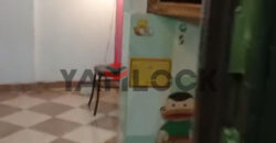 شقه للبيع علي شارع رئيسي امام محكمه الجيزه ومحطه مترو ام المصريين